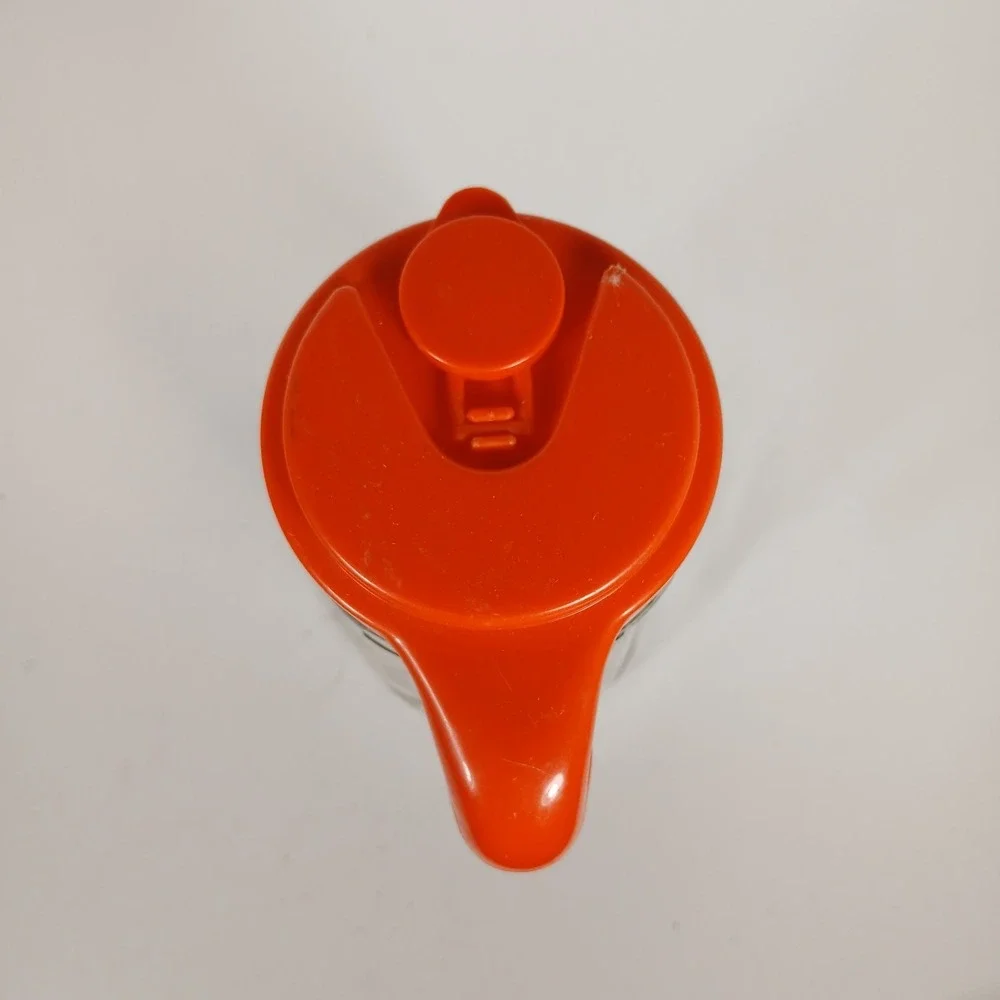Vintage Anchor Hocking Glass Swirled Tang Pitcher with Orange Flip-Top Lid